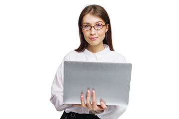 Young woman with glasses holding a laptop ready for a new project in a bright and inspiring workspace