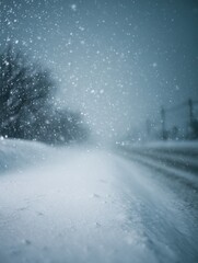 Blizzard with snowflakes falling heavily from the sky