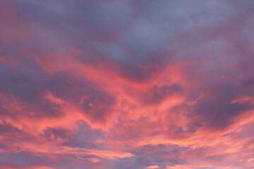 Dramatic pink and purple sunset sky cloudscape