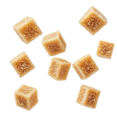 Floating brown sugar cubes scattered on a black background in a studio shot with soft diffused lighting
