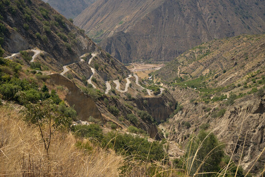 Curvy paved road in remote landscape
