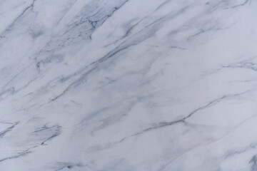 Grey and white marble textured background.