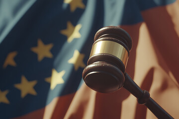 Gavel over flag with stars: Represents legal decisions, justice, or governance in a specific context. Symbolizes authority and legal proceedings.