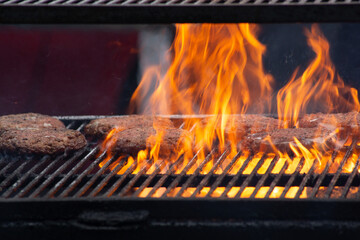 Flames meet flavor – burgers grilled to perfection.