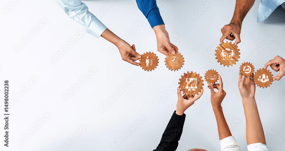 Leinwandbilder hands of diverse individuals hold gear icons, symbolizing teamwork and collaboration in business man