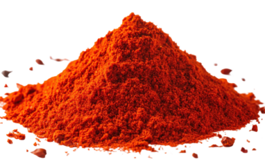 Pile of red pepper flakes on a white background