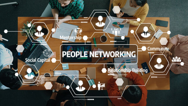 Visual representation of people collaborating while networking, emphasizing mentorship, community, and social capital within a productive and innovative environment. Amity