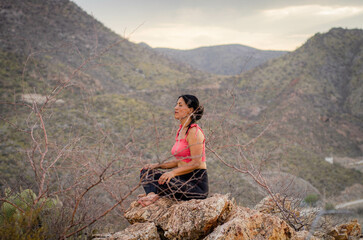 woman doing yoga in the afternoon