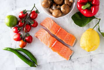 fresh, healthy ingredients and salmon on the table. fish for dinner with mushrooms