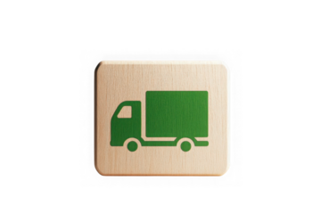 Green delivery truck icon on wooden block