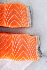 Pieces of fresh raw salmon on the table. Cooking fish
