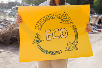 A green Eco logo with recycling symbols, promoting environmental awareness and sustainability.