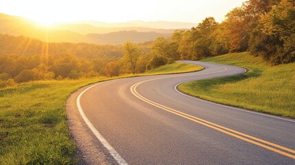 Fototapeta premium Curving road at sunset