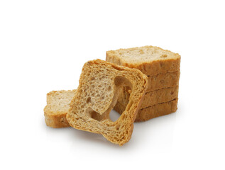 Whole wheat mini toasts, toasted slices of bread or rusks isolated on white background	