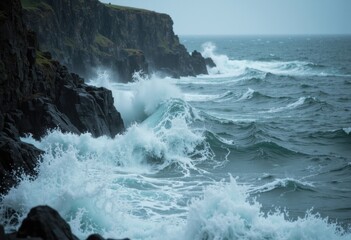 Fototapeta premium Dramatic ocean waves crashing against rugged cliffs on a stormy day