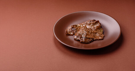 Steak, grilled beef, sirloin cooked on the barbecue with salt and spices