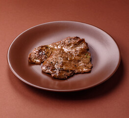 Steak, grilled beef, sirloin cooked on the barbecue with salt and spices