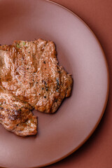 Steak, grilled beef, sirloin cooked on the barbecue with salt and spices