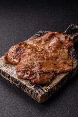 Steak, grilled beef, sirloin cooked on the barbecue with salt and spices