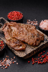 Steak, grilled beef, sirloin cooked on the barbecue with salt and spices