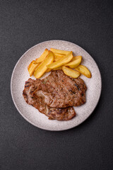 Steak, grilled beef, sirloin cooked on the barbecue with salt and spices