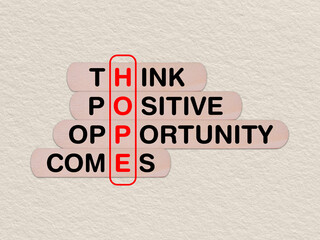 concept word hope, crossword written on wooden stick, business hope concept with copy space