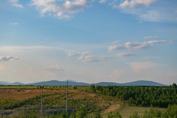 Picturesque nature of Russia with fields of sunflowers