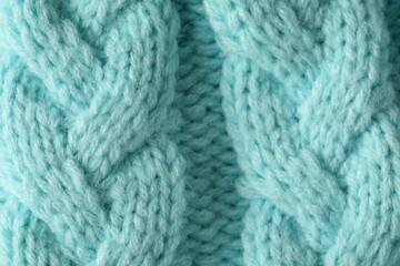 Texture of turquoise wool fabric as background, top view