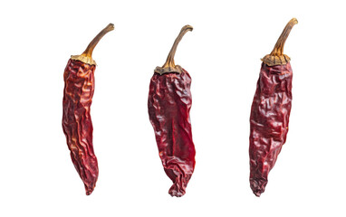 Three dried up red peppers are shown in a row