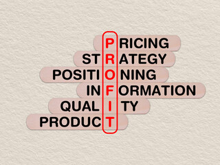 concept word profit, crossword written on wooden stick, business profit concept with copy space