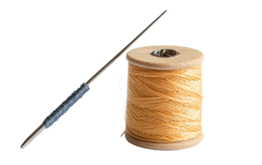 Needle and thread are shown next to a spool of thread