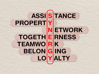 concept word synergy, crossword written on wooden stick, business synergy concept with copy space