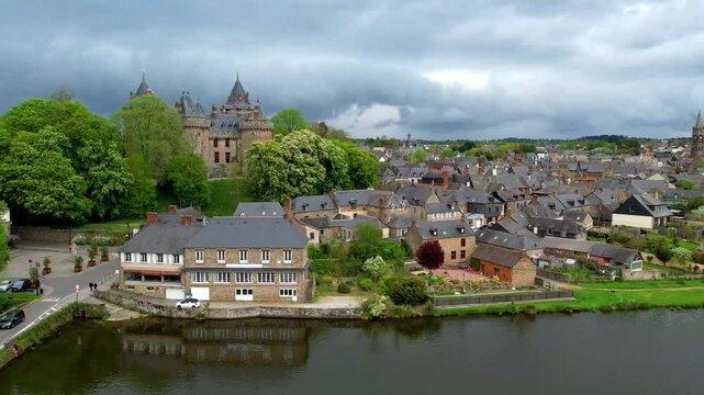 France scenic places. Romantic Combourg village and magnificent medieval castle nestled on the beautiful lake  Tranquille in Brittany, 