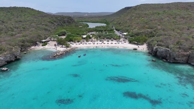 Daaibooi Beach In Willemstad Netherlands Curacao. Tourists Enjoying A Sunny Day At A Caribbean Sea. Shore Horizon Beach Sea. Shore Panorama. Willemstad Netherlands.