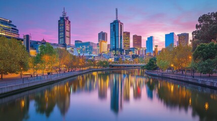 Fototapeta premium Vibrant City Skyline Reflected in Calm River at Sunset in Melbourne