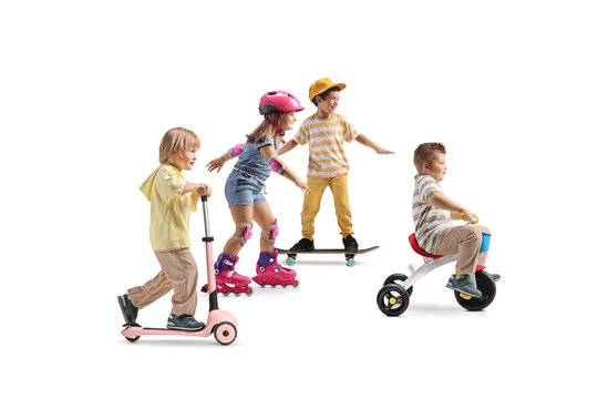 Group of kids riding bicycle, skateboard and rollerblades
