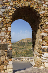 Fototapeta premium View through Arco Romano an ancient roman arch
