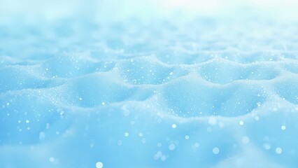 Obraz premium Ocean Wave Texture - Light Blue Abstract Background. An abstract background featuring a light blue wave texture, reminiscent of the ocean surface. The smooth curves and soft lighting create a calming 