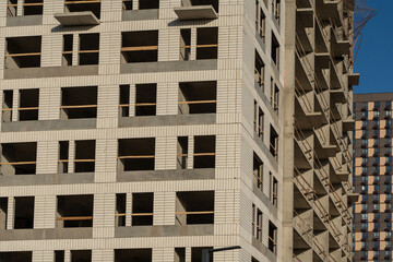 Construction of multi-storey residential buildings. Skyscrapers for housing.