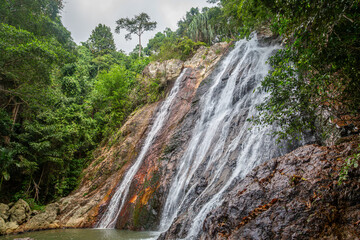 Na mueang waterfall or Na muang 1 waterfall can be seen in the middle of a jungle setting located on the Thai island of Ko Samui