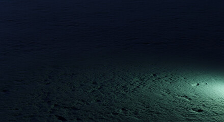 Dark deep water surface with mysterious light