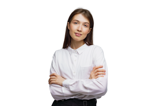 Confident young woman poses with crossed arms, exuding calm elegance in a minimalist setting
