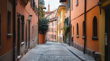 Quiet cobbled street in an Italian village with colorful buildings