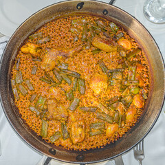 Valencian paella, a typical dish from Valencia, is one of the best-known dishes in Spanish cuisine
