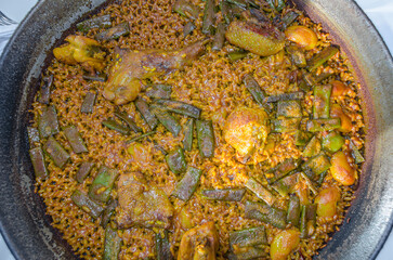 Valencian paella, a typical dish from Valencia, is one of the best-known dishes in Spanish cuisine