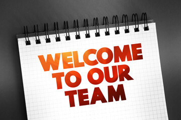 Fototapeta premium Welcome To Our Team text on notepad, concept background