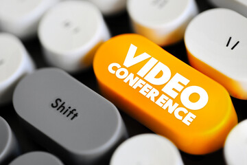 Video Conference - is a live, visual connection between two or more people in different locations using video-enabled devices, text button on keyboard