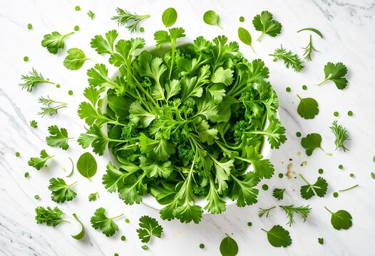 A metal bowl filled with lots of green vegetables.