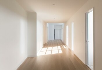 Obraz premium A long hallway with white walls and wood floors.