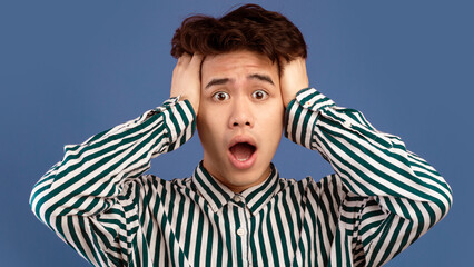 No Way, It's Unbelievable. Portrait of shocked scared asian guy emotionally reacting to news,...